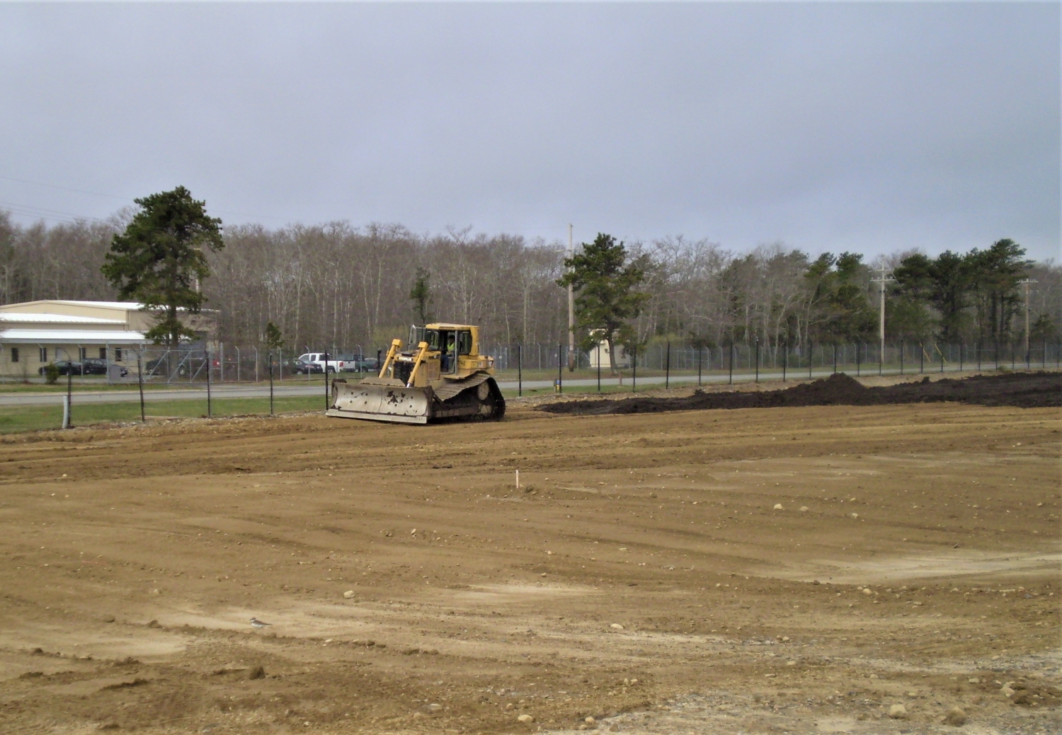 Leveling the ground after demolishing a fuel storage facility
