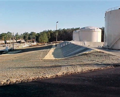 a containment area around the new fuel tank with HDPE liner with a 4” concrete cover