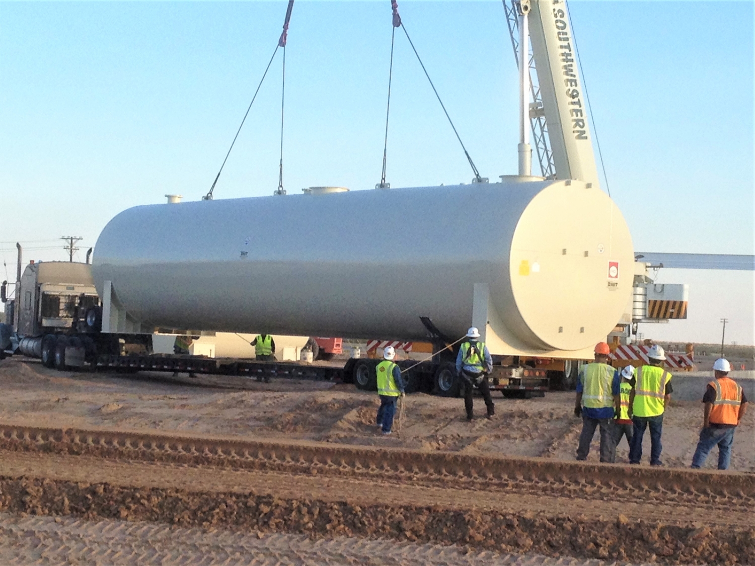 Installing a 50,000 gallon factory fabricated double wall above ground JP-8 fuel storage tank