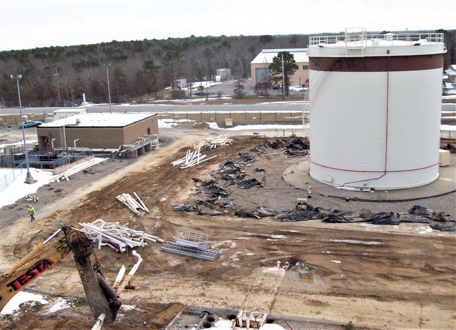 A progress picture of the demolition of a fuel facility