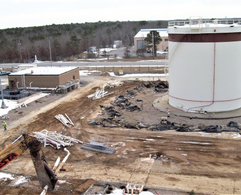 A progress picture of the demolition of a fuel facility